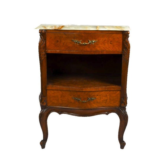 This antique French provincial nightstand offers timeless elegance paired with practical bedside function. Crafted from...