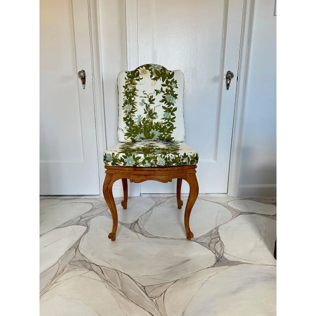 Carved in solid teak, by Massant the french furniture company, these Louis XIV style lattice back dining chairs have...