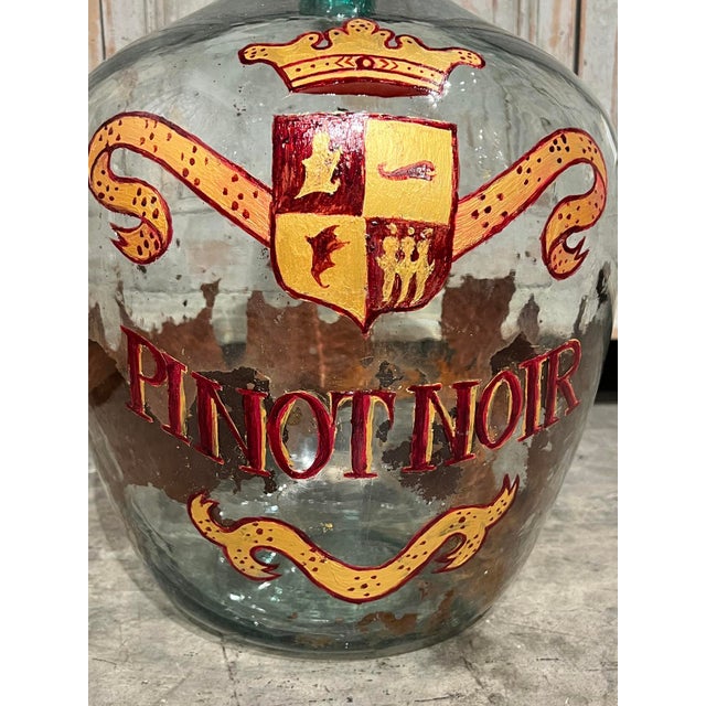 More information coming soon… This painted demi john bottle is quite a find, as the vessel is still nestled in its...