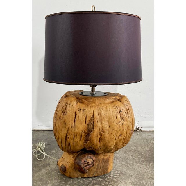Pair of stunning vintage mid century era knotty burl wood table lamps. Two very substantial burlwood specimens make...