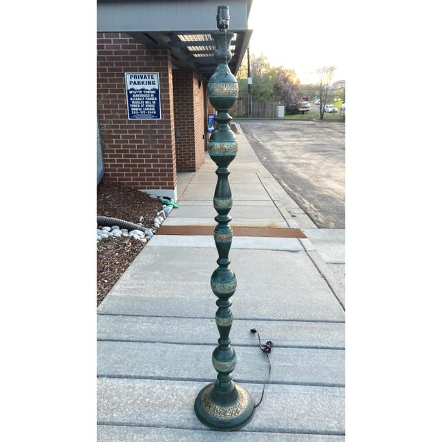 Tall floor lamp in verdigris bronze finish with phenolic bulb holder and brass pull chain, circa mid twentieth century,...