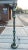 Tall floor lamp in verdigris bronze finish with phenolic bulb holder and brass pull chain, circa mid twentieth century,...
