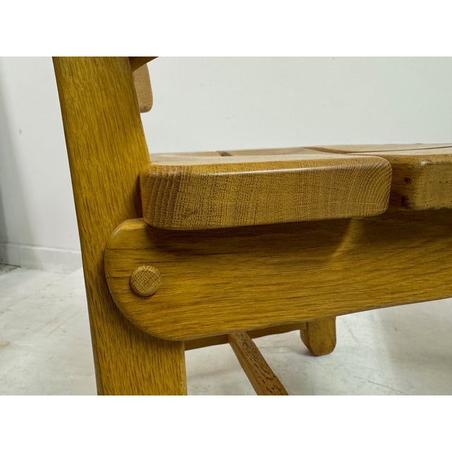 A striking set of six solid oak dining chairs, combining bold Brutalist character with the rustic warmth of Spanish-style...