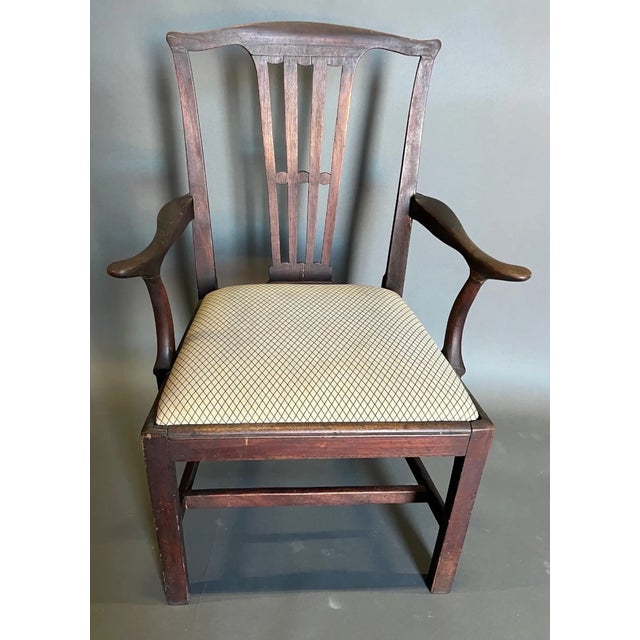 Comfortable and sharp-looking 18th-century British mahogany armchair with slip seat.