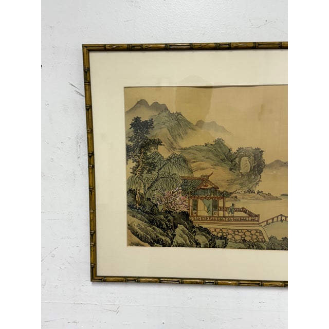 Design Plus Gallery presents a Vintage Chinese Landscape Art Work in Bamboo Frame. Its scenery is serene; a home in a area...