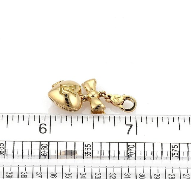 Louis Vuitton Heart & Bow Locket 18k Yellow Gold Charm Pendant For Sale In Miami - Image 6 of 6