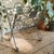 Elevate your home decor with this Folding Magazine or Record Holder, featuring an elegant green glass medallion that adds...
