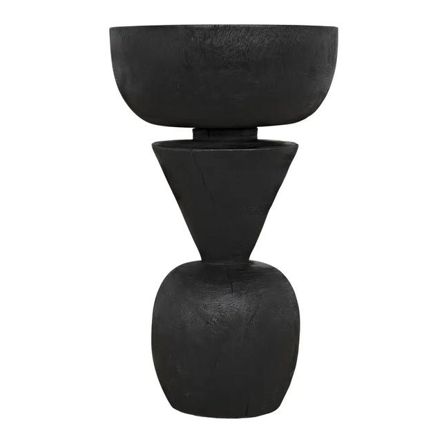 The Nogozi Side Table is a stylish and functional piece that will enhance the aesthetic of your living space. This elegant...