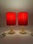 A pair of vintage table lamps in the Mid-Century Modern style, originating from Europe and dating back to the 1960s–1970s....