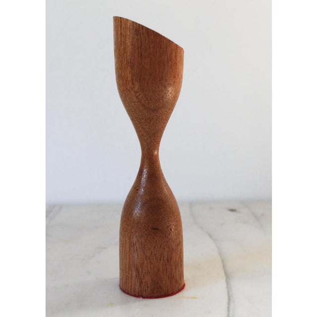 Mid-century modern sculptural teak candle holder. No makers mark. Minor wear.