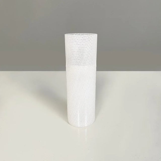 Cylindrical vase in white and transparent Murano glass. The two colors intertwine, forming a spiral. 1960s. Good...