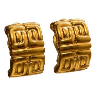 1980s Givenchy Gold Logo Clip Earrings For Sale