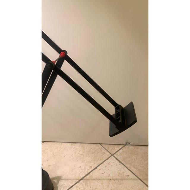 Tizio table lamp designed by Richard Sapper for Artemide in 1972 Black lacquered aluminum structure Two articulated arms...