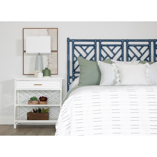 The timeless elegance of our Chippendale bed will elevate any room with its sophisticated charm. A headboard expertly...