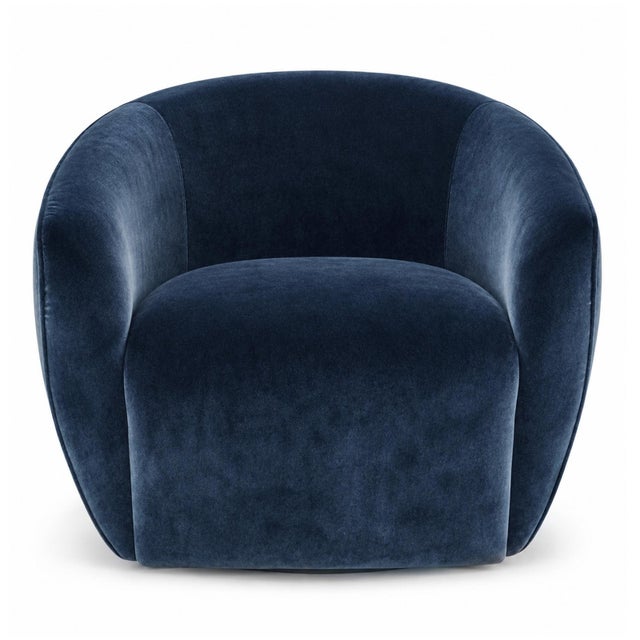 Midnight blue velvet swivel bubble chair. Base also wrapped in blue velvet. Seat height is 17". This chair weighs approx....