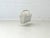 Elegant vintage magazine rack made of lacquered metal with a finely crafted wire mesh and a decorative wooden handle. The...