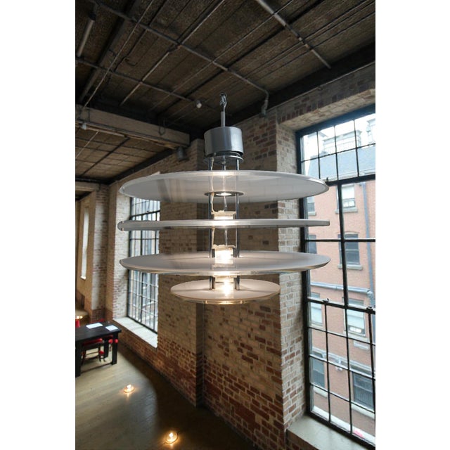 The Space Age Model 9944 Flash Gordon Pendant by Stig Ahlström & Clas Kock for Atelje Lyktan, Sweden, 1980s is a signature...