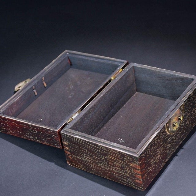 This is a beautiful vintage Chinese wooden box, crafted from a dense, dark hardwood (resembling Zitan or Rosewood) with a...