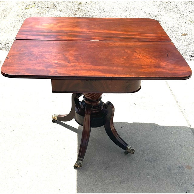 Auburn Antique Flame Mahogany, Regency-Style, Flip-Top, Rotating, Game Table, W/Hidden Drawer, Carved Pedestal, Brass Claws and Casters. C1810 to 1820 For Sale - Image 8 of 12