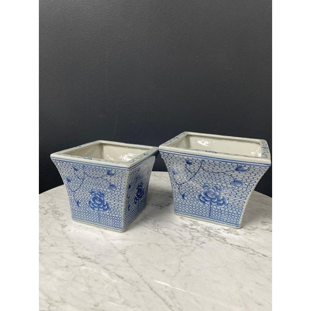 Beautiful blue and white square Asian planter set has a delicate floral design. These do not have drainage holes. Small is...