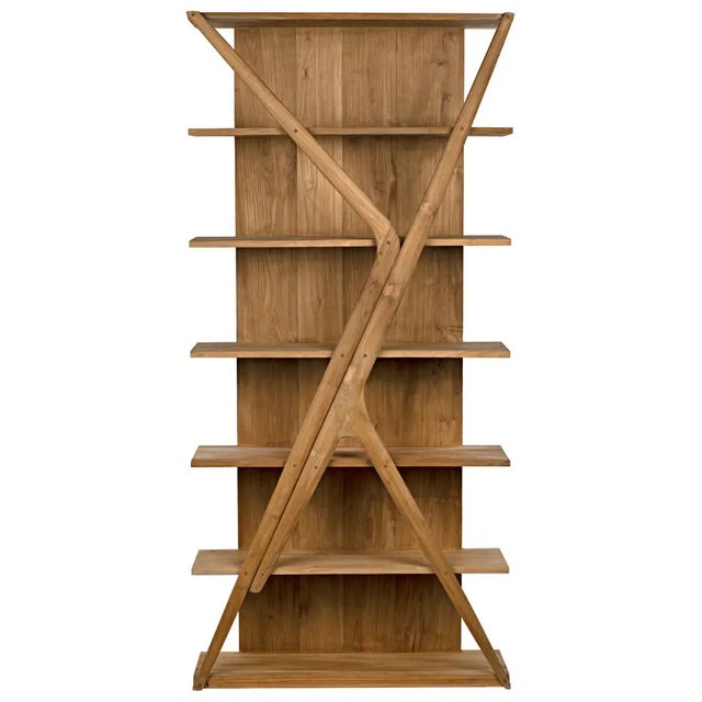 Strikingly carved of naturally finished teak, this unique bookshelf from Noir features and exuberant “X" embellishment...