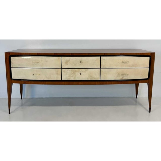 Elegant Italian dresser from the 1950s attributed to Paolo Buffa, defined by soft lines and refined proportions typical of...