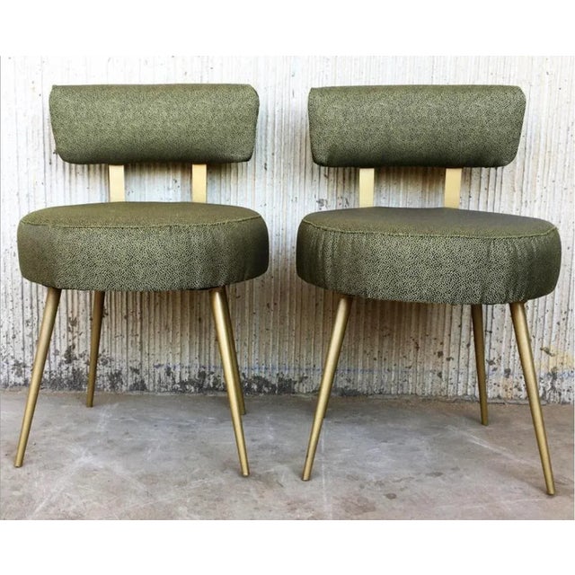 Midcentury pair of green and gilded round stools with back. Recently upholstered. Beautiful conical legs. Very comfortable.