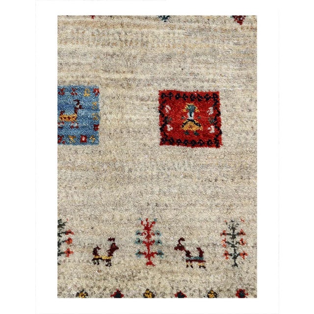 The word “Gabbeh” literally translates to “in the rough,” and it is an accurate description of this style of Persian rug....