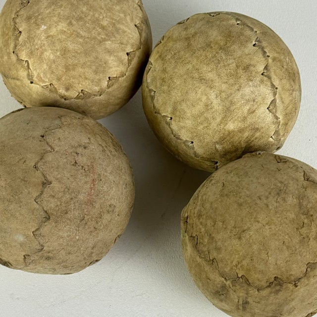 A beautiful set of 4 1930s vintage clincher softballs. Great for decorative purposes and home accents. They are 4"...