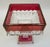 Tall ruby red square shape with clear glass pattern on the bowl and base candy dish pedestal or compote. The red is known...