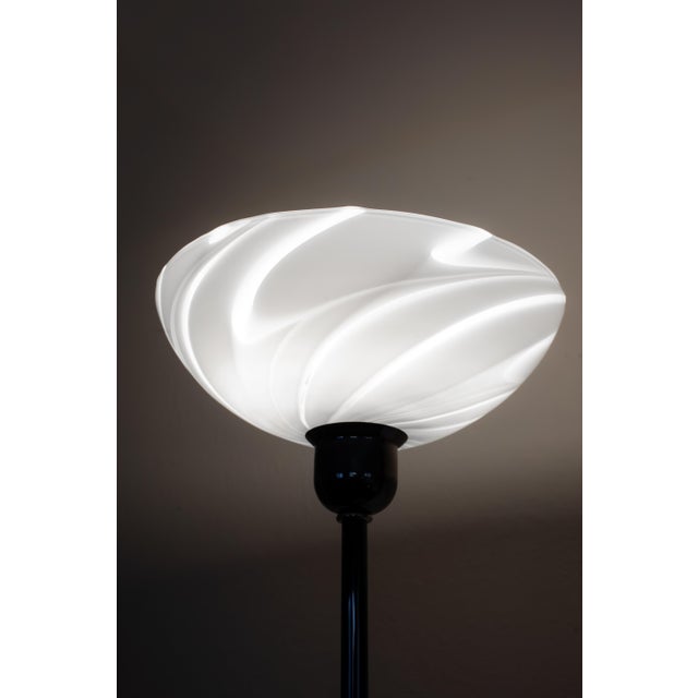 This vintage DUPLO 471 floor lamp, produced by the Italian brand Microdata Milano in the early 1980s, is a prized...