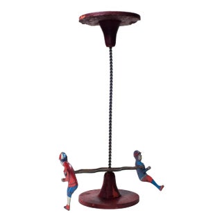 Antique Early 20th Century Tin Lithograph Spinning Toy For Sale