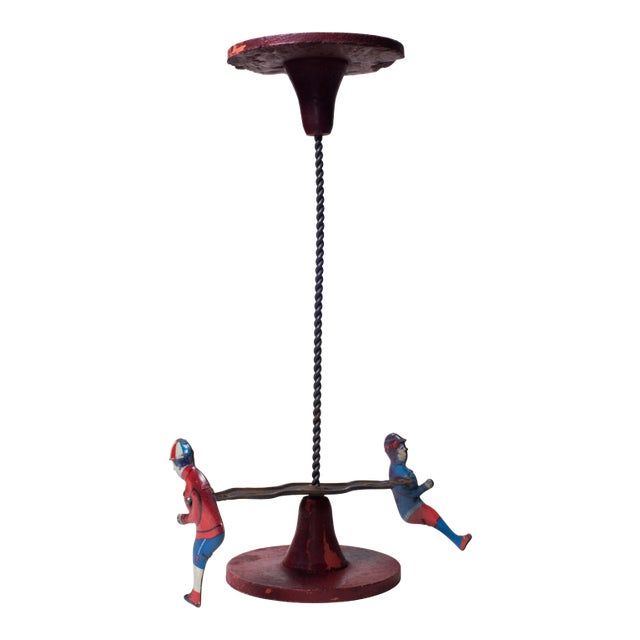 Antique Early 20th Century Tin Lithograph Spinning Toy For Sale