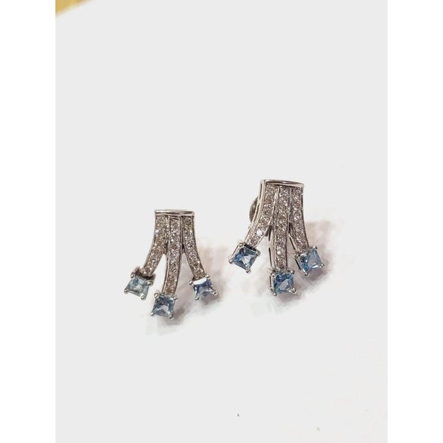 A very dainty and beautiful Aquamarine Stud Earrings set in 18K White Gold & Diamonds. The weight of the Aquamarine is...