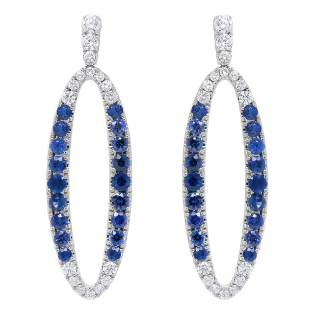 18K White Gold 1.11 Cttw Blue Round Diamond and Blue Sapphire Openwork Oval Shaped Dangle Earrings (F-G Color, VS1-VS2 Clarity) For Sale