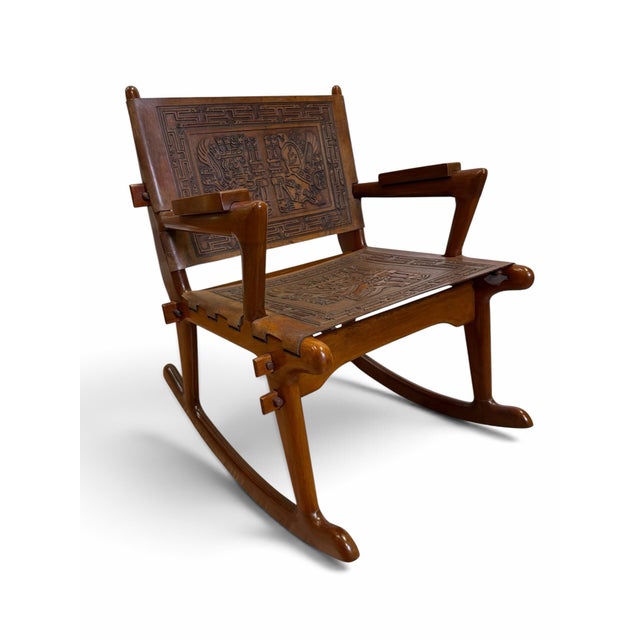 An exceptional mid-century modern brutalist rocking chair designed by Angel Pazmiño for Muebles de Estilo in Ecuador...