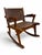 An exceptional mid-century modern brutalist rocking chair designed by Angel Pazmiño for Muebles de Estilo in Ecuador...