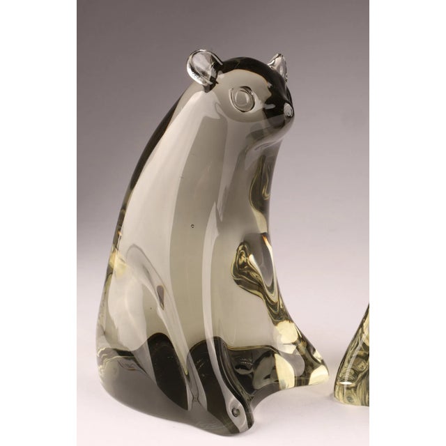 Sculptural pair of Murano art glass bear figures designed by Livio Seguso, dating to the 1970s. Executed in clear and...