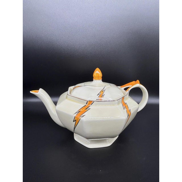 A rare Art Deco porcelain tea set designed by Hugh Longport for Konny Kraft, dating from the 1920s–1930s. This set...
