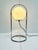 Sculptural German table or floor lamp from the 1960s, made of chrome-plated metal with a large glass sphere. At 66 cm...