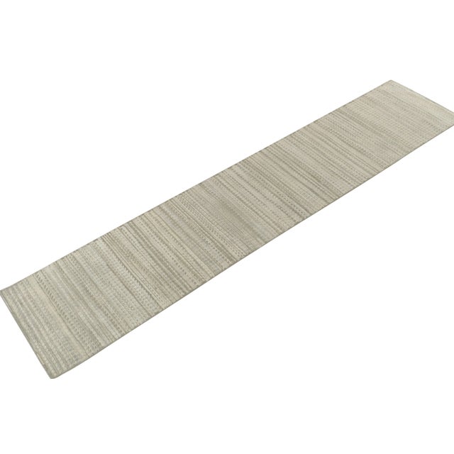 Hand knotted in a fine blend of wool & silk, a scintillating 2x12 runner from Rug & Kilim’s bold modern selections. On the...