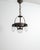 A rare and early Swedish jugend ceiling lamp in patinated and iron with four decorative and sculptural frosted glass...