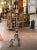 Bring dramatic scale and old-world character to a living room, library, or bedroom with this elegant antique floor lamp...