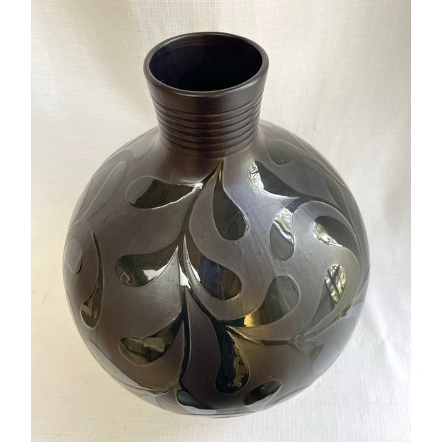 The large scale of this late 20th century studio vase gives the piece a sculptural quality. It features contrasting black...