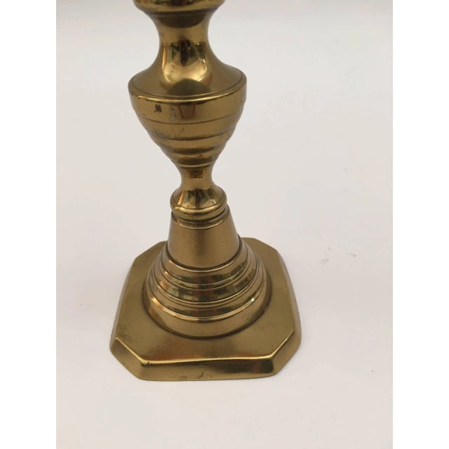 Pair of Victorian English polished brass candlesticks. 19th Century Pair of hollow core cast brass beehive candlesticks...