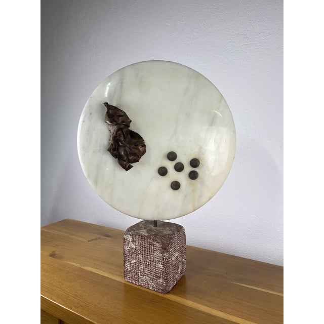 Double-sided marble sculpture with metal parts in a modernist style, made in Italy in the 1960s. The sculpture has been...