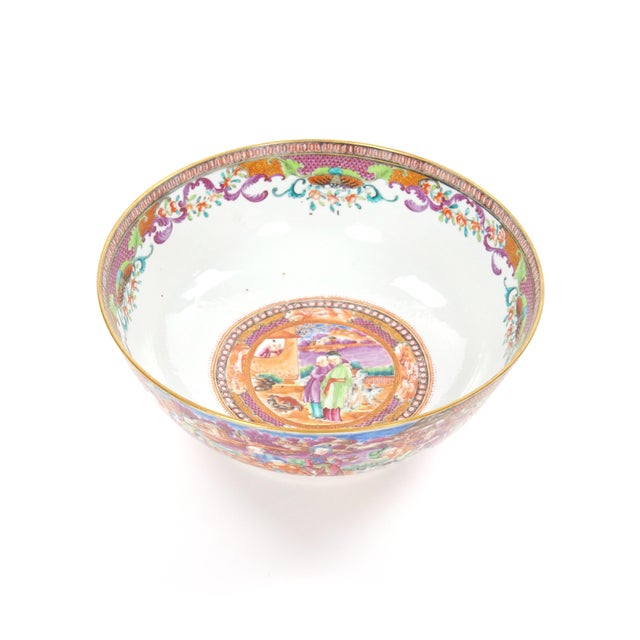 This remarkable punch bowl is an exquisite example of Chinese export porcelain from the 18th century, made circa 1736...