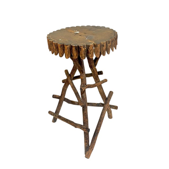 Authentic antique Adirondack twig side table showcasing classic rustic craftsmanship and organic form. This charming piece...