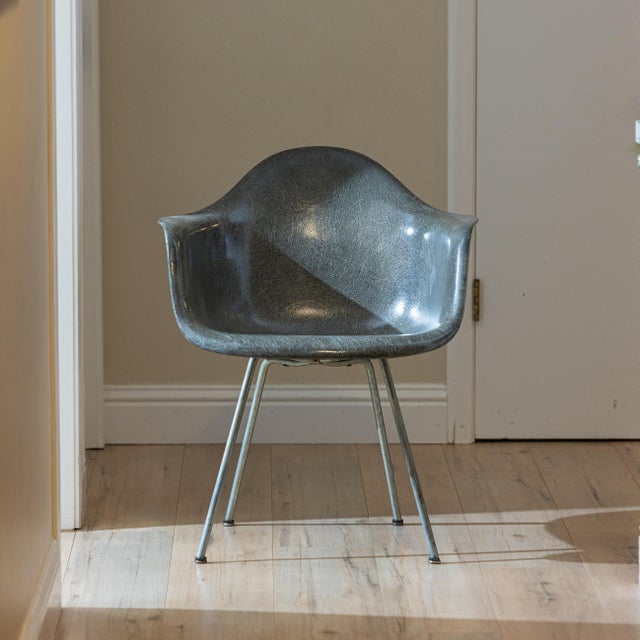 A landmark piece of mid-century history, this exceptionally rare, first-edition Eames DAX Armchair for Herman Miller is...