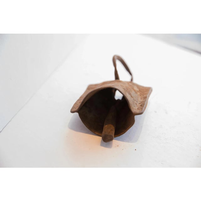 :: Vintage handmade African Yoruba iron bell. Circa late mid 20th century, though possibly older, this piece has such...